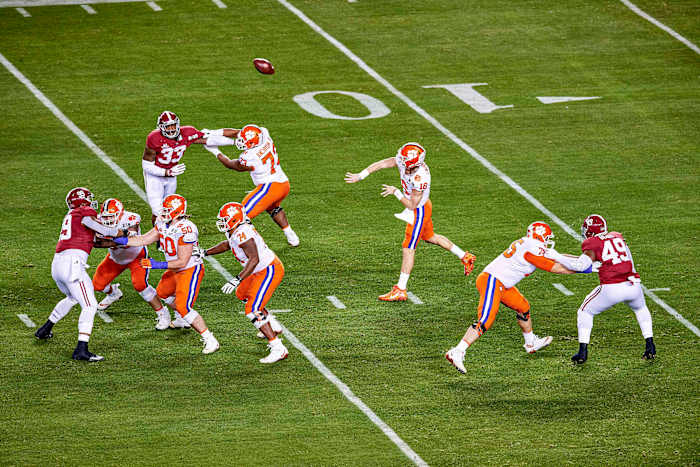 Trevor Lawrence throws a pass against Alabama in the national title game his freshman year at Clemson